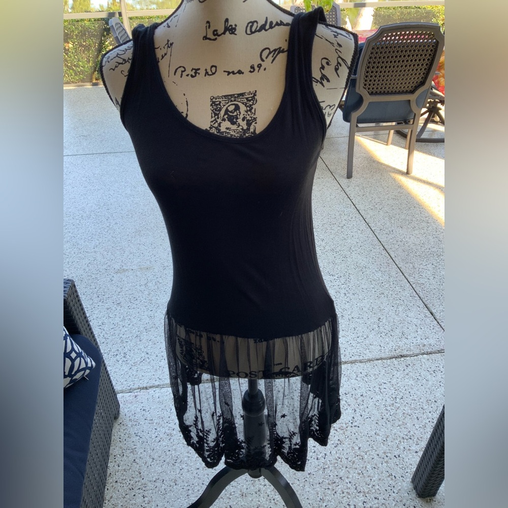 Gently worn once Wanna B top with lace bottom.